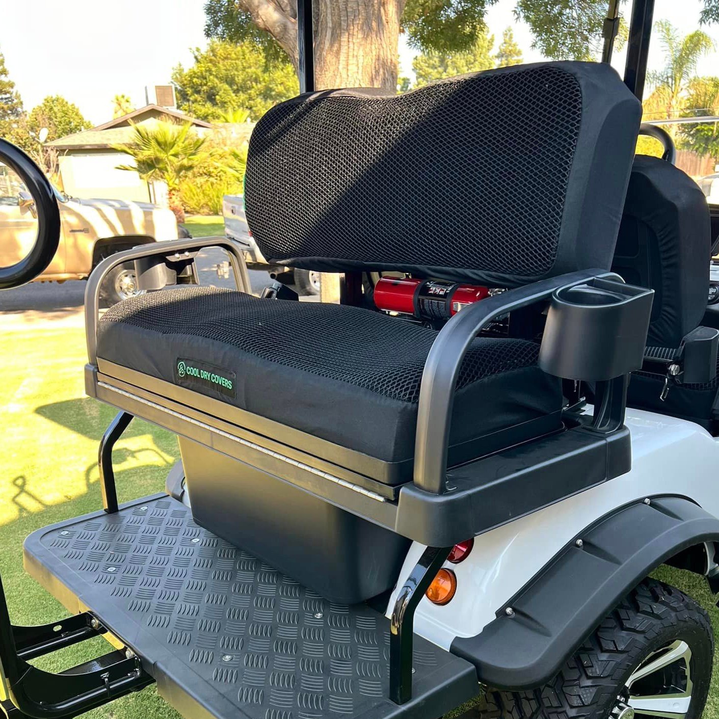 Cool Dry Covers seat covers set for your rear seat kit.  We can make models for aftermarket and OEM rear seat kits. Keeps you raised off the original vinyl seat so much cooler in the heat with air circulation.  Also allows water to pass through without being absorbed so you stay much drier in the wet.  Comfort in all conditions.  Shown here on an Evolution Forester Golf Cart.