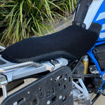 Cool Dry Covers seat covers to fit your BMW R1200GS Rally seat (pictured).  Keeps you raised off the original seat, much cooler in the heat and allows air circulation.  Water goes through without being absorbed so you stay drier in the wet.  These are sized to fit your specific seat perfectly.  Transform your ride with Cool Dry Covers.