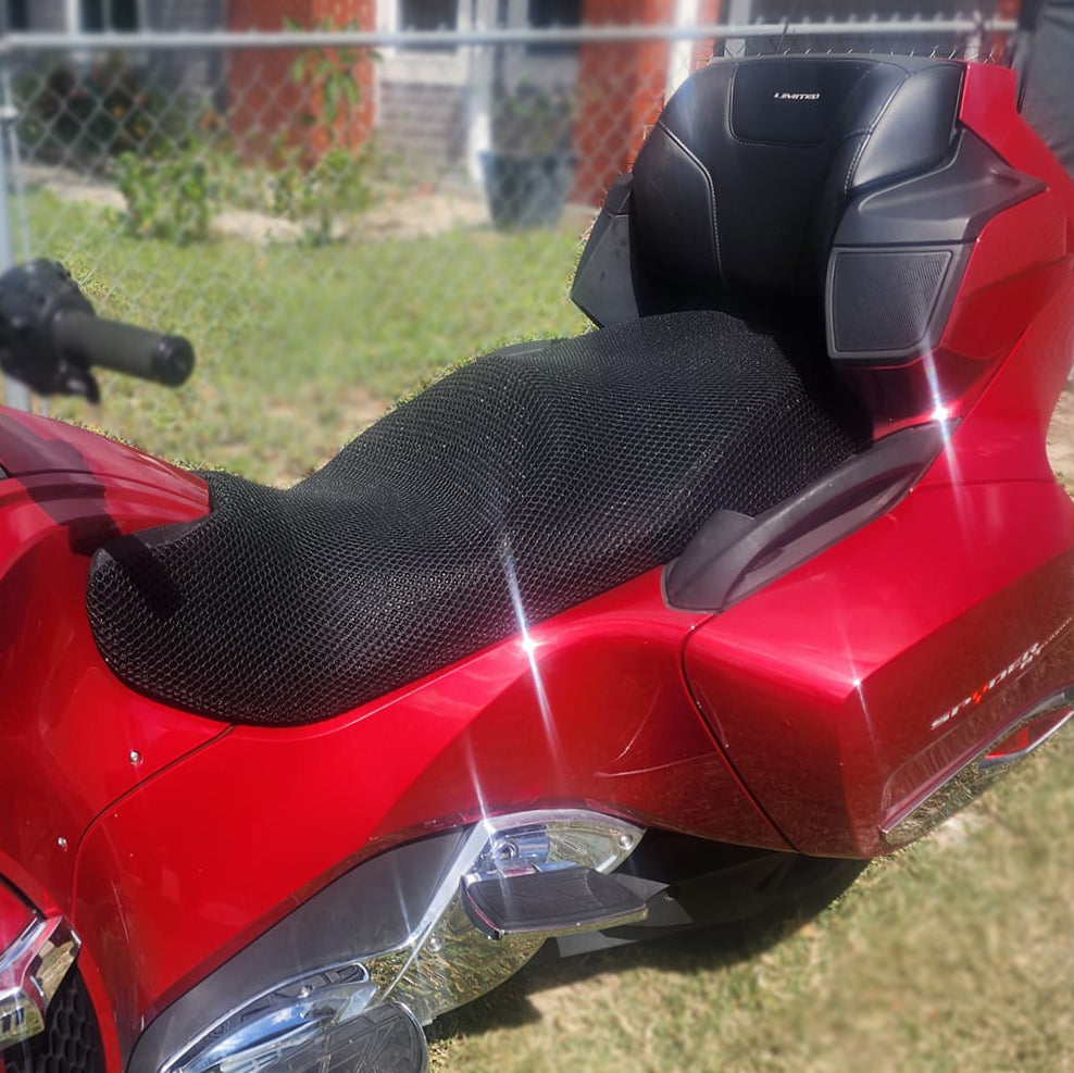 Cool Dry Covers motorcycle seat covers feature a unique 3-dimensional mesh which keeps you raised off the seat for added comfort, staying much cooler in the heat and allowing beneficial air circulation. Water flows through without absorbing so you stay drier on the wet days. Sized specifically for your bike seat.  Shown here installed on a Can Am Spyder RT Ltd one piece seat.