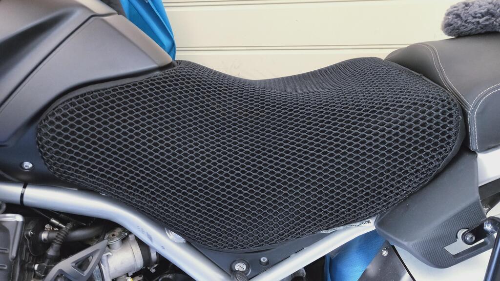 Cool Dry Covers seat covers to fit your Moto Guzzi Stelvio Rider Seat (pictured).  Keeps you raised off the original seat, much cooler in the heat and allows air circulation.  Water goes through without being absorbed so you stay drier in the wet.  These are sized to fit your specific seat perfectly.  Transform your ride with Cool Dry Covers.