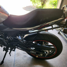 Load image into Gallery viewer, Cool Dry Covers seat covers to fit your Suzuki SV650X (pictured).  Keeps you raised off the original seat, much cooler in the heat and allows air circulation.  Water goes through without being absorbed so you stay drier in the wet.  These are sized to fit your specific seat perfectly.  Transform your ride with Cool Dry Covers.
