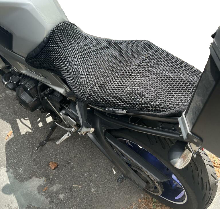 Cool Dry Covers seat covers to fit your Yamaha MT-09 (pictured).  Keeps you raised off the original seat, much cooler in the heat and allows air circulation.  Water goes through without being absorbed so you stay drier in the wet.  These are sized to fit your specific seat perfectly.  Transform your ride with Cool Dry Covers.