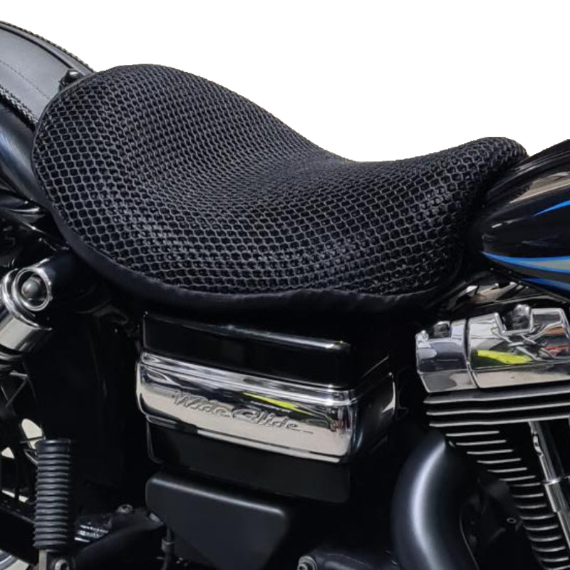 Cool Dry Covers seat covers to fit your Harley Street Bob Rider Seat (pictured).  Keeps you raised off the original seat, much cooler in the heat and allows air circulation.  Water goes through without being absorbed so you stay drier in the wet.  These are sized to fit your specific seat perfectly.  Transform your ride with Cool Dry Covers.